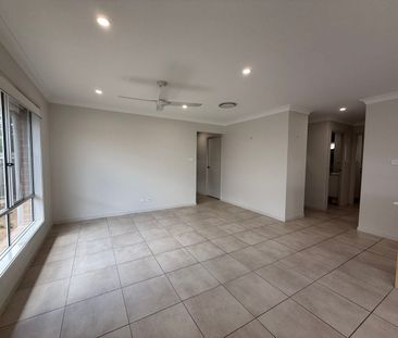 Modern Family Home with Comfort, Style & Space - Photo 1