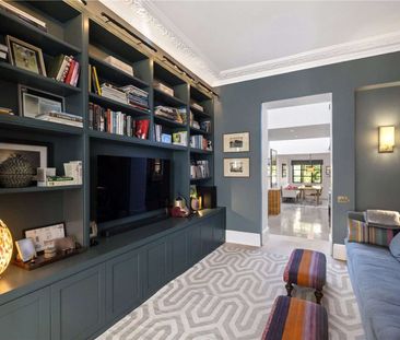 A spectacular five bedroom home with off-street parking and a beaut... - Photo 1