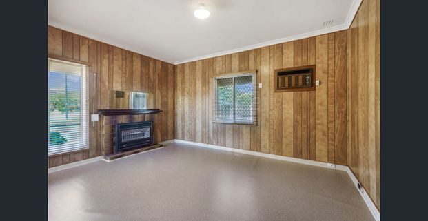 Secure Family Home in Tranquil Setting - Photo 1