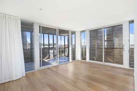 STUNNING COASTAL ARCHITECTURAL ABODE FLOODED IN NATURAL LIGHT - Photo 4