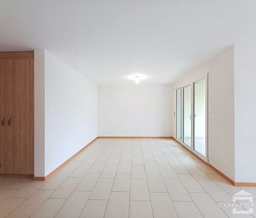 Bel appartement de 3,5 pièces au rez-de-chaussée avec terrasse - Photo 1