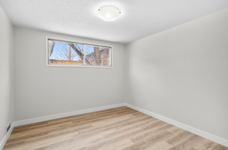 Renovated Lower Level Suite | Bright Open Layout | Private Laundry | North Glenmore Park - Photo 3