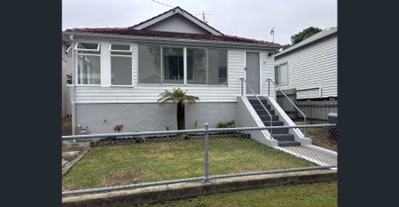 Fully Renovated Coastal-Inspired Home Just Minutes from the Beach - Photo 4