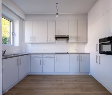 Gezellig gelijkvloers appartement met tuin! - Photo 3