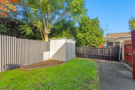 🌞 Sunny, North-Facing Brick & Tile Home - Photo 3