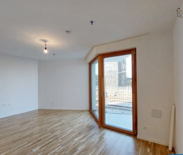 Sonnwendviertel: 1-Zimmer-Wohnung mit Balkon im 16. OG – Fitnessrau... - Foto 2