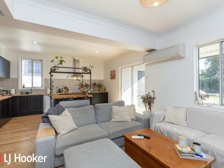 Spacious 3-Bedroom Home with Large Backyard and Modern Features - Photo 2