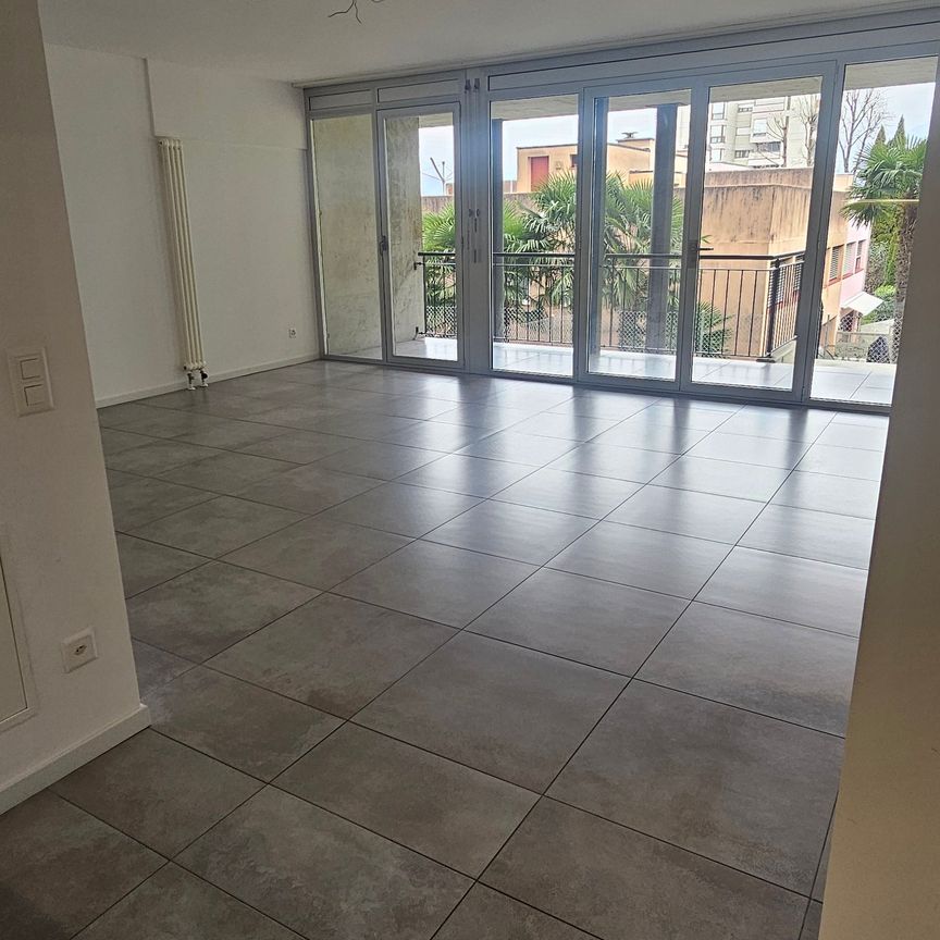 Moderno appartamento 2.5 locali con terrazza e giardino privato a Pazzallo - Foto 1
