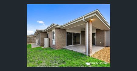 Enjoy a low-maintenance, family-friendly home that combines comfort, quality, and convenience in one of Redland Bay's most sought-after estates. - Photo 3