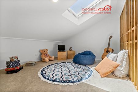 Spacious Designer Home with Flexible Living Across Three Levels - Photo 4