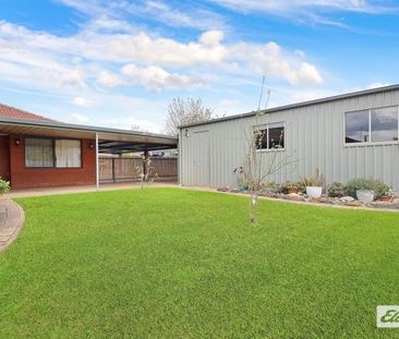 Charming 3-Bedroom Home with Outdoor Extras & Workshop! - Photo 4