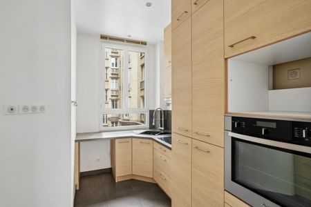 Location Appartement 3 pièces 99m² PARIS 17ème - Photo 5