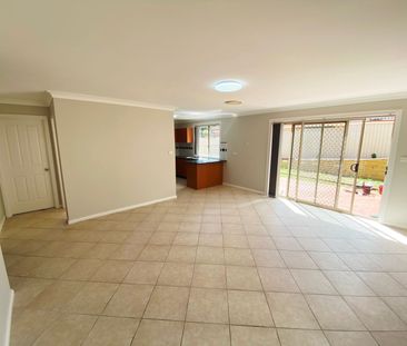 Immaculately Presented 4-Bedroom Family Home - Photo 3