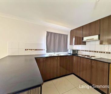 Modern two-bedroom home with water included - Photo 6