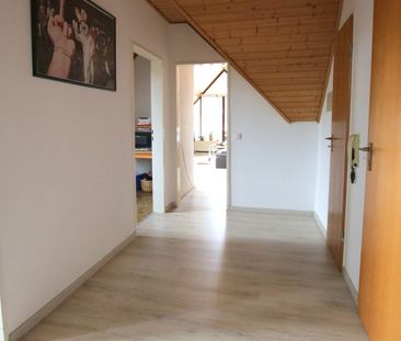 Charmante 2-Zimmer-Dachgeschosswohnung mit Loggia in Bad Zwischenahn - zentrale Wohnlage - Foto 2