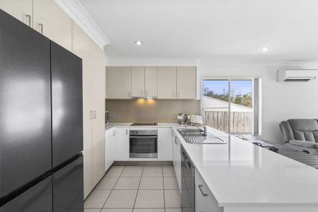 Modern, Low-Maintenance Living in a Prime Coomera Location - Photo 2