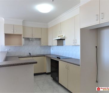 STUNNING PENTHOUSE APARTMENT WITH DISTRICT VIEWS - Photo 6