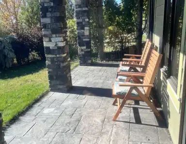 Spectacular 2 bedroom, Garden level walk-out suite located on wildlife reserve | Okotoks - Photo 1