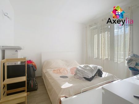 A LOUER - ROANNE CENTRE - APPARTEMENT T4 AVEC DEUX CHAMBRES, DEUX BALCONS, CAVE ET STATIONNEMENTS GRATUITS - Photo 5