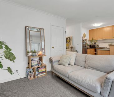 Charming one-bedroom retreat steps from station street - Photo 2