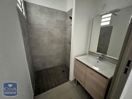 Location Appartement 4 pièces 115m² STE CLOTILDE 97490 - Photo 2