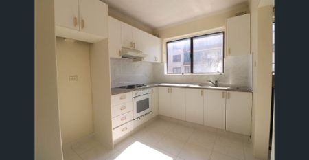 WITH LOCK UP GARAGE - Photo 2