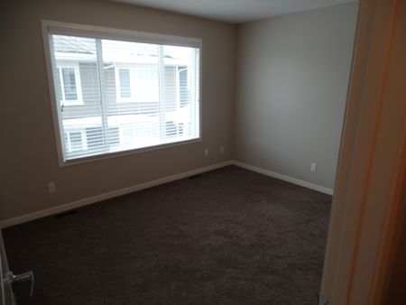 Like new, double garage 3 bdrms townhouse in Panorama hills! - Photo 3