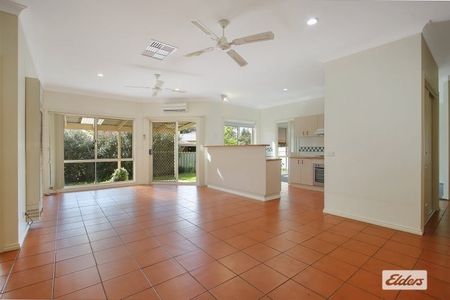 Charming 3-Bedroom Home with Lush Gardens - Photo 2