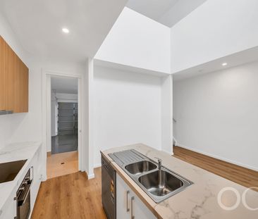 Open the Door to Brand-New Family Living with Dual Living Zones - Photo 6