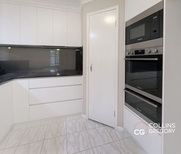 Spacious Four-Bedroom Home with Ducted AC & Dual Living Areas - Photo 2