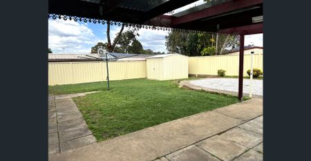 CONVENIENTLY LOCATED FAMILY HOME - Photo 5