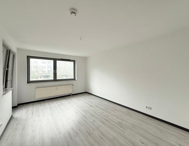 Schöne 3-Zimmer-Erdgeschosswohnung mit Balkon in zentrumsnaher Lage - Photo 1