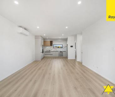 Stylish Three-Level Living in a Prime, Convenient Location - Photo 1