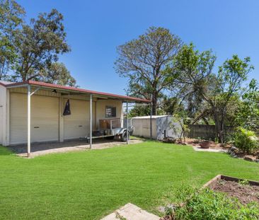 A Perfect Family Home with a Shed, Carports and Outdoor Oasis - Photo 3