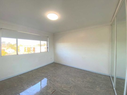 Bright and Sunny, Tiled Unit with Split System AC! - Photo 1