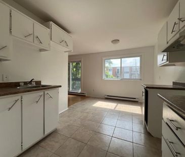 1 MOIS GRATUIT | 3 1/2 avec Balcon + Stationnement - Photo 2