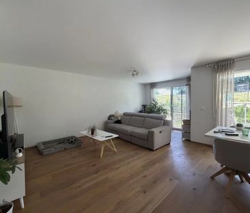 Appartement de 3.5 pièces au rez-de-chaussée avec jardin privatif - Photo 1