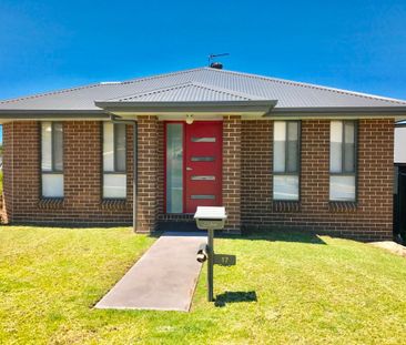 Modern Family Corner Block Living in Brooks Reach Estate - Photo 1