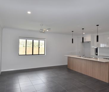 MODERN FOUR BEDROOM HOME IN THE HEART OF RIVERSTONE RISE - Photo 1