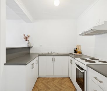 Open the Door to City Living with Comfort and Style - Photo 1