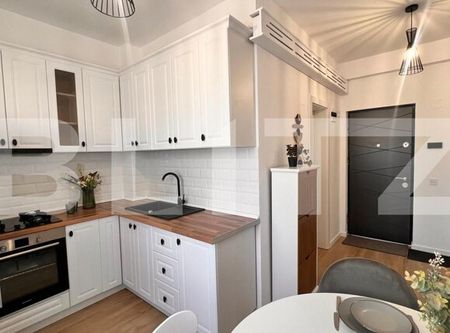 Garsonieră modernă, 37,65 mp, mobilată complet, parcare subterană, zona Rovine - Photo 3
