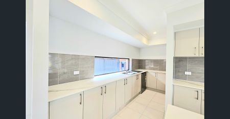 Brand NEW Five Bedroom Family Residence in North Kellyville Oasis - Photo 3