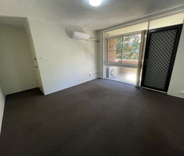 Well presented two bedroom unit with single garage in a great locat... - Photo 2