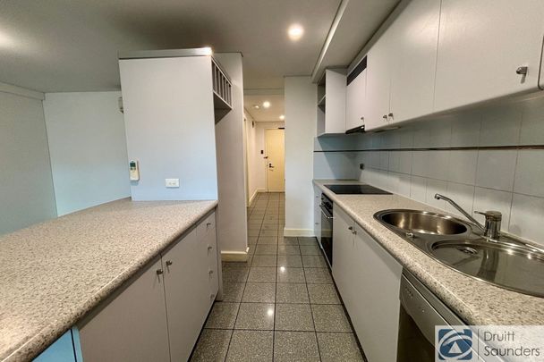 BEACHSIDE APARTMENT IN HIGHLY SOUGHT AFTER COMPLEX - Photo 1