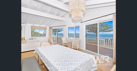 ESCAPE THE ORDINARY AND ENJOY BEACH-FRONT LIVING AT ITS FINEST - Photo 4