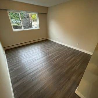 TWO BEDROOM AND BATHROOM MAIN LEVEL UNIT @ PARKWOOD GARDENS - Photo 1