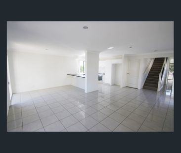 Comfortable Four-Bedroom Home with a Fully Fenced Yard - Photo 1