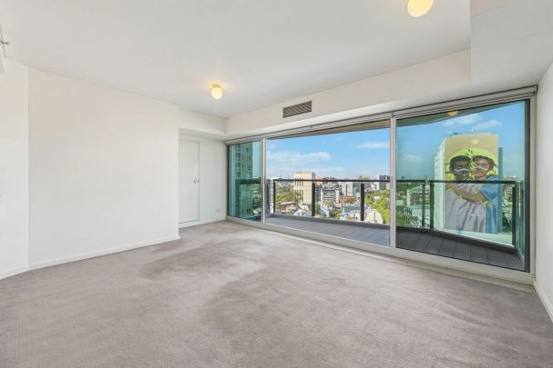 Elevated ‘Zenith’ Residence of Style & Convenience | Unfurnished - Photo 1