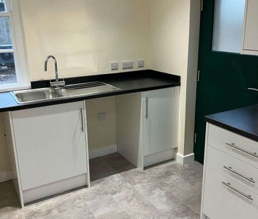 A well-presented two-bedroom semi-detached cottage situated in an a... - Photo 6