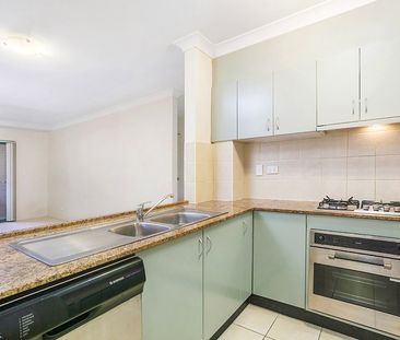 Take a Walk on The Quiet Side with this Two Bedroom Unit - Photo 2